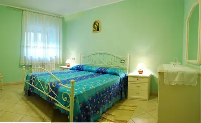Letto o letti in una camera di B&B Da Franca