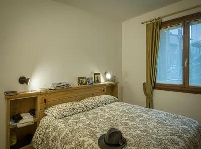 Letto o letti in una camera di PaeseMio Cervarezza di Bolzoni Maria Graziella