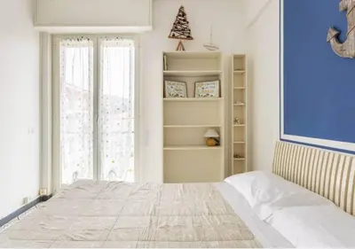 Letto o letti in una camera di Aria di mare
