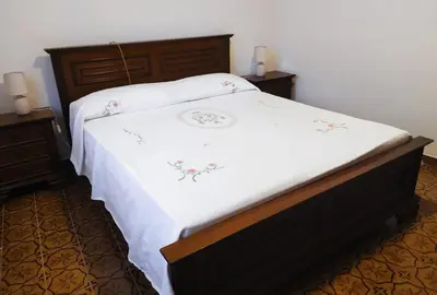 Letto o letti in una camera di CASA SILVANA