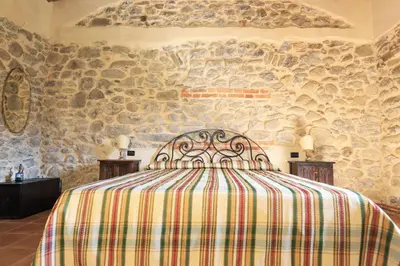 Letto o letti in una camera di Agriturismo La Cascina dei Chicchi