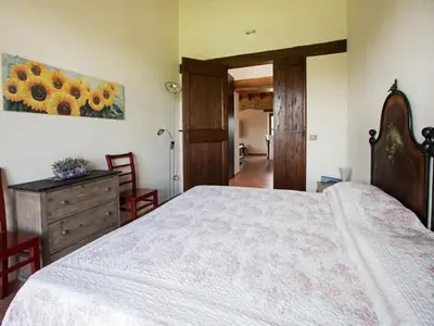 Letto o letti in una camera di Sunny holiday home with swimming pool