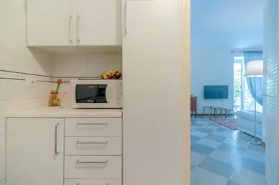 Cucina o angolo cottura di CASA CLAUDIA Relax con Patio e Parcheggio