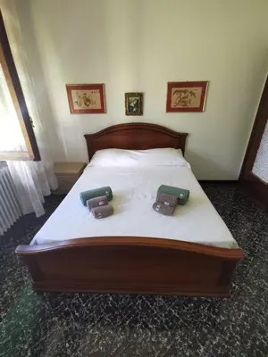 Letto o letti in una camera di Villa Olga - Lunigiana