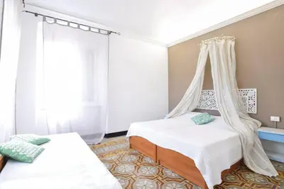 Letto o letti in una camera di Appartamento della piazza