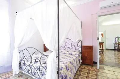 Letto o letti in una camera di Appartamento della piazza