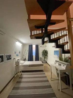 Letto o letti in una camera di Cuor di Mantova B&B