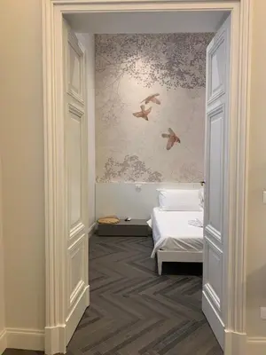 Letto o letti in una camera di Niki O. Charme
