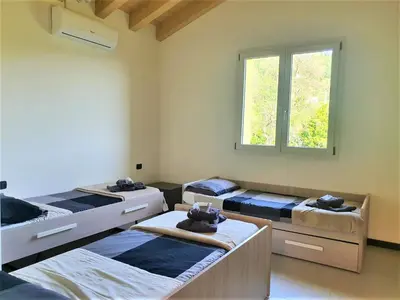 Letto o letti in una camera di Villa Joana