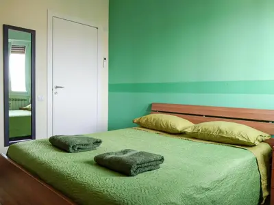 Letto o letti in una camera di Casa Bignardi - Affitti Brevi Italia