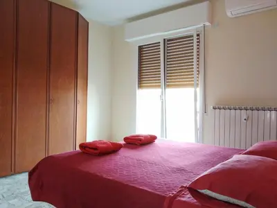 Letto o letti in una camera di Casa Bignardi - Affitti Brevi Italia