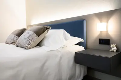 Letto o letti in una camera di VistAmare Luxury Retreat Appartamenti