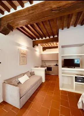 Area soggiorno di Palazzo Borgocolonne Apartments - Manu Maison
