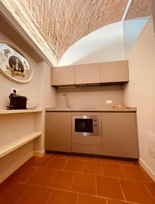Cucina o angolo cottura di Palazzo Borgocolonne Apartments - Manu Maison