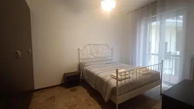 Letto o letti in una camera di Battisti