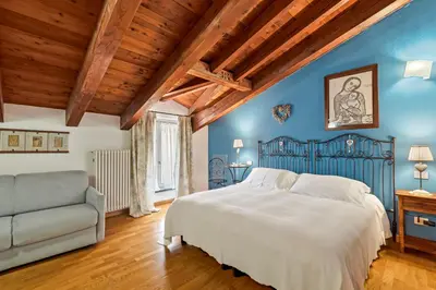 Letto o letti in una camera di Affittacamere La Collina Degli Ulivi