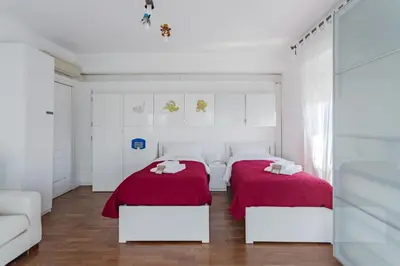 Letto o letti in una camera di Casa Eleonora - Pavia - By HOST4U