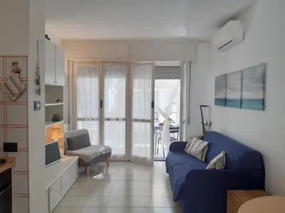 TV o dispositivi per l'intrattenimento presso La terrazza tra il Mare e gli Ulivi by Holiday World