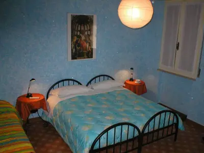 Letto o letti in una camera di La Buonanotte
