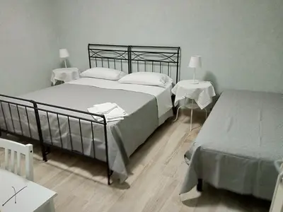 Letto o letti in una camera di La Buonanotte
