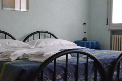 Letto o letti in una camera di La Buonanotte