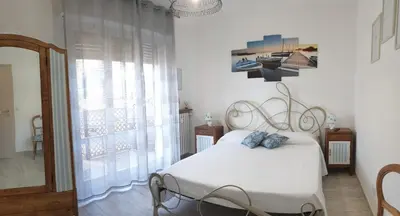 Letto o letti in una camera di Casa Paola