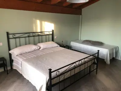 Letto o letti in una camera di Il nido dello scricciolo
