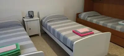 Letto o letti in una camera di Il fuso di Maria