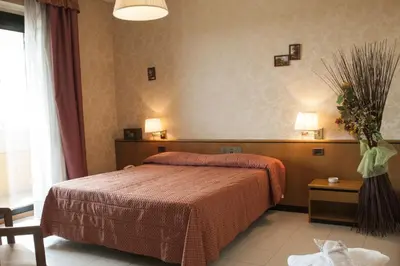 Letto o letti in una camera di Le Gronde