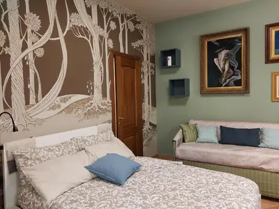 Letto o letti in una camera di Casa degli Artisti