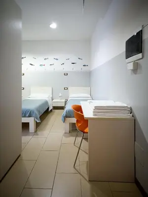 Letto o letti in una camera di L'Archetto