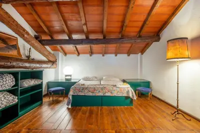 Letto o letti in una camera di GuestHost - Splendido apt con piscina e parking a Colorno