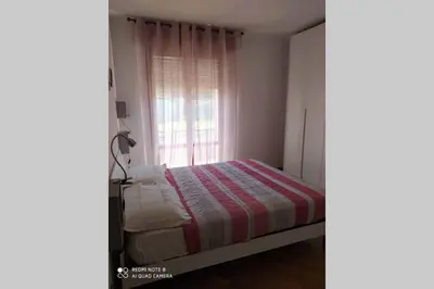 Letto o letti in una camera di Casa Riccò di Cinzia e Samuele