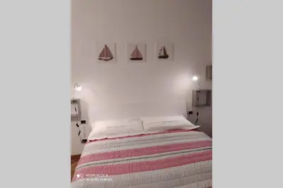 Letto o letti in una camera di Casa Riccò di Cinzia e Samuele