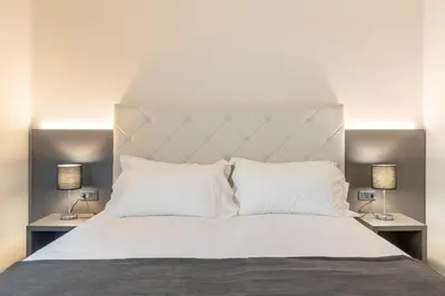 Letto o letti in una camera di Villa Petra