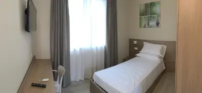 Letto o letti in una camera di TERRAZZA Rooms