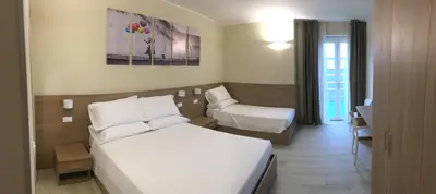 Letto o letti in una camera di TERRAZZA Rooms