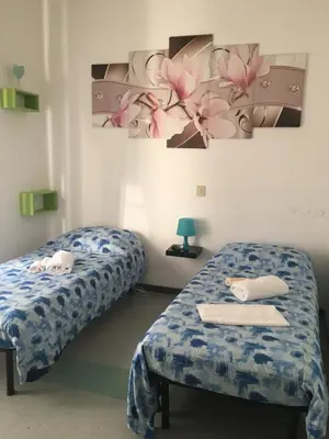 Letto o letti in una camera di Residence Corso Europa
