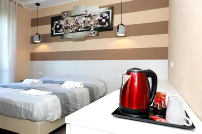 Letto o letti in una camera di Residence Corso Europa