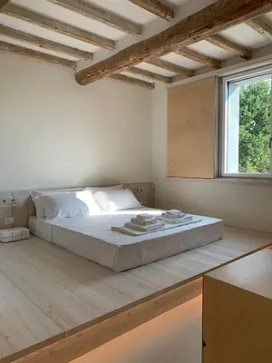 Letto o letti in una camera di La Pervinca - Ospitalità, Natura, Cura