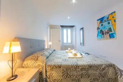 Letto o letti in una camera di Nonna Sandrina in Monferrato hills - Happy Rentals