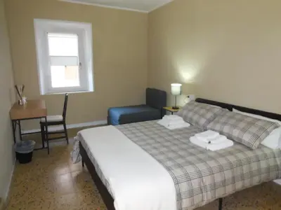 Letto o letti in una camera di Le Camere della Piazza