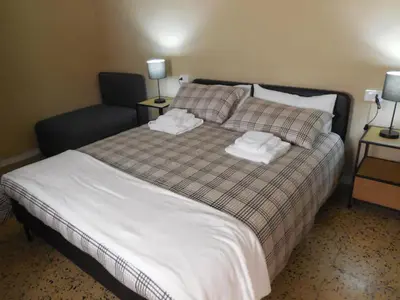 Letto o letti in una camera di Le Camere della Piazza