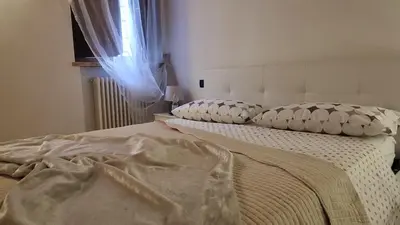 Letto o letti in una camera di Ca' degli Sposi