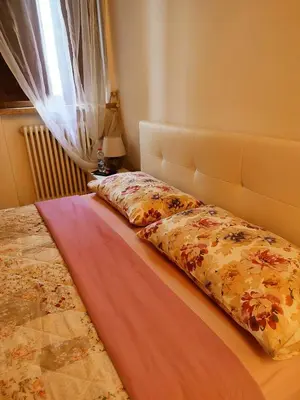 Letto o letti in una camera di Ca' degli Sposi