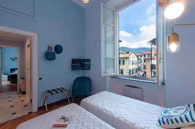 Letto o letti in una camera di Casa Garibalda - seafronf apartment