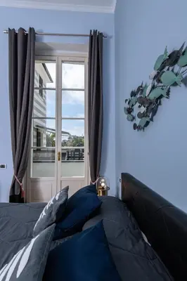 Letto o letti in una camera di Casa Garibalda - seafronf apartment