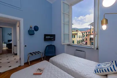 Letto o letti in una camera di Casa Garibalda - seafronf apartment