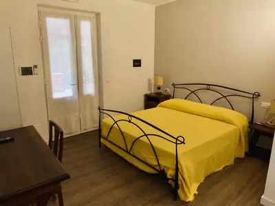 Letto o letti in una camera di Loggia Piani Nuovi