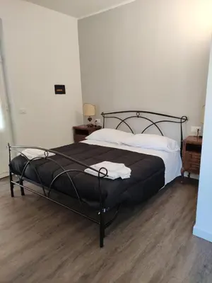 Letto o letti in una camera di Loggia Piani Nuovi
